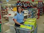 Cop With Toy-Filled Shopping Cart